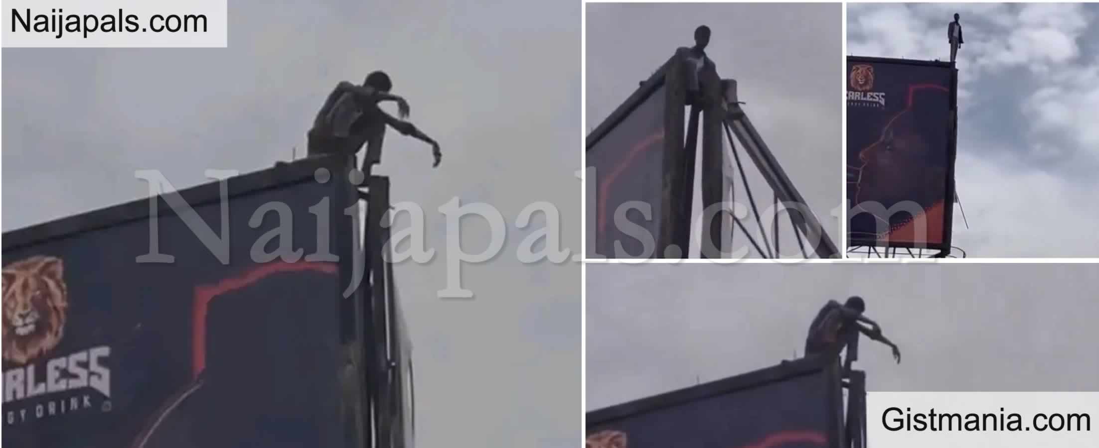 SHOCKING! Man Spotted at The Top of a Giant Billboard in Kano In Suspected Su!c!de Attempt (VID)
