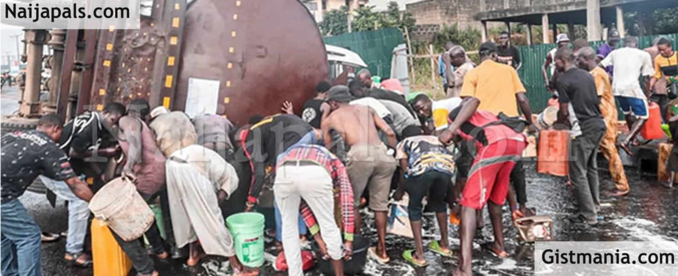 Public Health Alert As Residents Scoop Cooking Oil From Gutter After Tanker Fell  in Lagos